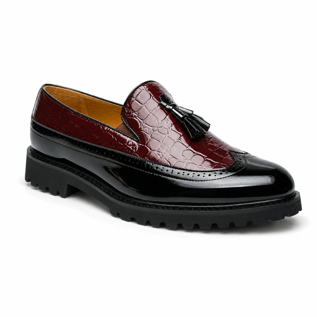 mocassins homme noir en cuir à glands vue solo sur fond blanc